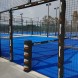 Beschermer van de padelbaan deur