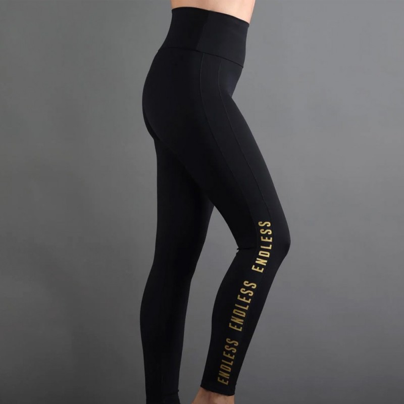 Endless Syncro zwarte gouden tight Endless Syncro zwarte gouden tight